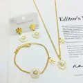 Elegant gold stainless steel jewelry set featuring white daisy pendants and small rhinestones - Three-Piece Set