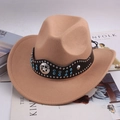 Khaki western cowboy hat with studded leather belt and blue rhinestones on magazine background - Rhinestone Arc Strap / Camel