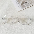 Detail shot of transparent irregular frames with cat-ear accents on white texture - Clear