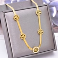 Gold-plated herringbone necklace with Tree of Life pendants and pavé crystal accents - Necklace
