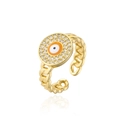 Detail of golden evil eye ring with white crystals and chain-link adjustable band - Orange Evil Eye Style (11922)