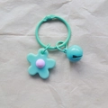 Mint green flower keychain with a matching metal ring and small bell accessory - Mint Green