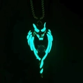 Close-up of the glowing green luminous wolf head pendant with wings in the dark - Luminous Light Blue Wolf Head - Titanium Steel Chain - 70cm