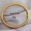 Detailed view of gold beaded titanium steel bracelet with 6cm diameter and 18g weight - Beaded Style / Gold