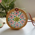 Handcrafted round rattan shoulder bag with colorful floral print and leather strap - Blue Dots Pink Flower