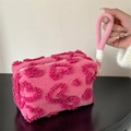 Pink plush cosmetic bag with 3D heart pattern and woven handle for travel storage - Handheld Plush Rose Red Heart