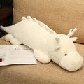 Detail of soft white dragon plush pillow resting on a sofa with cozy home decor - 70cm / White Dragon