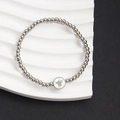 Bracciale a sfere 4mm in acciaio argento con ciondolo a orso su intarsio in madreperla - Stile Orso (NS09-9)