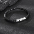 Macro detail of men's braided leather bracelet with polished stainless steel clasp - 21cm / Steel