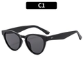 Chic black cat-eye sunglasses with silver rivets and sleek polished frames for women - Black Frame Grey Lens