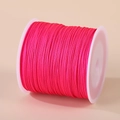 0.8mm rose red nylon cord on a spool for DIY jewelry weaving and handcrafted necklaces - Deep Rose Red