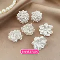 Detailed view of 3-pair earring set with pearls and floral studs on champagne silk - Style 2 (2# Silver Pin-White)