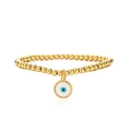 Macro view of gold-plated beaded bracelet featuring a detailed evil eye charm - Dark Blue