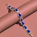 Bracelet élégant en or avec une pierre bleue en forme de poire et des cristaux brillants - 18cm / Bleu Royal