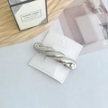Silver twisted metal hair clip with geometric spring design on white card - Large Twisted Silver