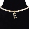 Elegant gold choker necklace featuring a sparkling crystal-encrusted letter E pendant - Letter E [Gold]