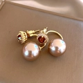 Elegant champagne pearl earrings with ruby center stone and cubic zirconia halos - Large Champagne Pearl Rhinestone Studs - Gold - Coffee