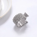 Detail of silver ponytail clip with full crystal rhinestones on a white plate - Silver