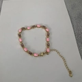 Bracciale placcato oro con ciondoli occhio rosa in smalto e zirconi quadrati viola - Rosa