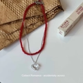 Double-layered beaded necklace with red beads and a transparent heart pendant - Layered Glass Bead Red Necklace