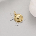 Macro detail of 14K gold evil eye sun pendant with 18.1mm height and 12.5mm width - H-11617/Golden Sunflower Eye