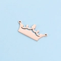 Conector de corona en acero inoxidable oro rosa pulido para joyería DIY en fondo azul - Oro rosa