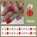 Set di 24 unghie finte natalizie rosse con glitter e disegni di renne modello W839 - W839 [Con Colla]