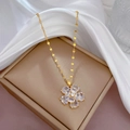 Titanium steel gold floral necklace with oval sparkling zircons on soft white silk - Flower Pendant (J232) / Gold