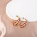Fashionable gold-tone twisted hoop earrings with red enamel finish and pearl accents - Gold (E00288-11)