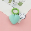 Mint green heart keychain with a green ring buckle and cartoon smiley face pendant - Heart Smiley Face / Mint Green