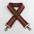 Close-up of vintage brown and beige striped wide canvas bag strap with bronze metal clips - Brown Beige Stripes