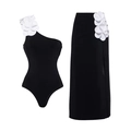 Detail of 3D white floral applique on black one-shoulder swimsuit and matching skirt - Black One-Shoulder Set