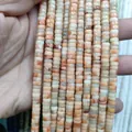 Macro shot of natural tiger eye and amethyst rondelle stone beads for jewelry making - Red Plum Stone