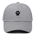 Close-up of black animal paw embroidery on grey cotton baseball cap with curved brim - Adjustable / Gray