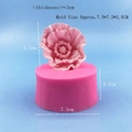 Pink 3D poppy flower silicone mold with finished floral candle on blue background - Poppy 6030 / Pink