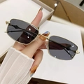Handheld vintage gold metal square frame sunglasses with dark grey geometric lenses - Gold Frame Grey Lens