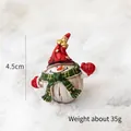 Miniature Christmas snowman figurine with red hat and green scarf for holiday decor - Snowman with Red Gloves