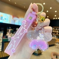 Lila Stern Treibsand Schlüsselanhänger mit rosa Kirschblüten Einhorn und Glocke - Sakura Einhorn-Lila