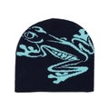 Detailed close-up of dark blue knitted frog beanie with precise embroidery on plain white - Navy Blue