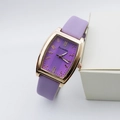 Detailed close-up of rose gold tonneau watch case with purple striped dial and leather strap - Purple