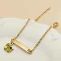 Bracelet chaîne dorée avec pendentif vache en émail coloré et plaque métallique lisse - Vache