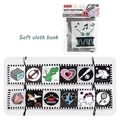 Black and white soft cloth book for newborns with high-contrast patterns and bedside ties - Style 66546-1 Early Education Cloth Book / Dinosaur/Soccer Series