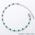 Detail view of a 4.0mm silver bracelet with round green gemstones and measurement labels - Bracelet / Platinum / Green Zirconia