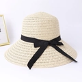 Women's foldable beige straw sun hat with large brim and elegant black ribbon bow - One Size / Beige