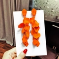 Detailed close-up of long orange petal tassel earrings with matte layered floral design - 3# Steel Earring Post-Eco-Orange Matte Petal Tassel Style