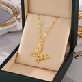 Elegante goudkleurige titanium stalen ketting met vlinder hanger en zirkonia steentjes - Goud