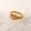 Detailed close-up of a vintage 18k gold plated ring with a square pink zircon gemstone - Gold Color Pink Zirconia