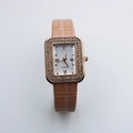Macro view of rectangular rose gold case with double-row rhinestones and Roman numerals - Pink Roman Dial
