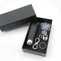 Detail view of carbon fiber leather key organizer set with metal components in gift box - Carbon Fiber Dots