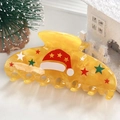 Pinza per capelli natalizia gialla traslucida con cappello di Babbo Natale e stelle - 10cm / Cappello di Babbo Natale giallo